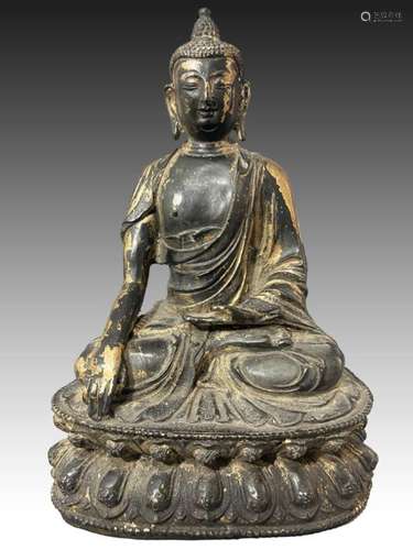 A CHINESE TIBETAN SEATED BRONZE BUDDHA