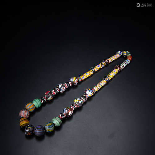 A GROUP OF PERSIAN GLASS BEADS FROM THE TANG DYNASTY