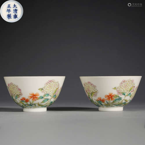 A PAIR OF COLORFUL CHINESE PORCELAIN WINE GLASSES FROM THE Q...