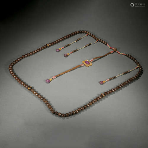 A SET OF CHINESE AGARWOOD BEADS FROM THE QING DYNASTY