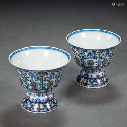 A PAIR OF CHINESE DOUCAI PORCELAIN CUPS FROM THE QING DYNAST...