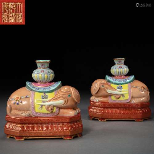 A PAIR OF COLORFUL CHINESE PORCELAIN ELEPHANTS FROM THE QING...