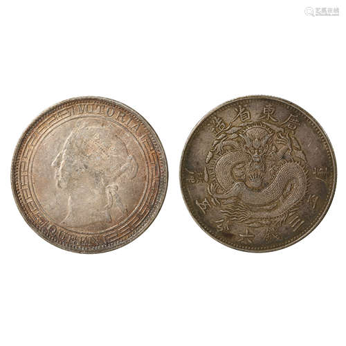 A PAIR OF CHINESE SILVER DOLLARS