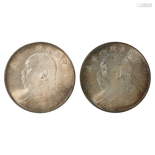 A PAIR OF CHINESE SILVER DOLLARS