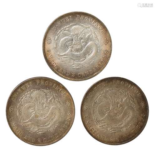 A SET OF CHINESE SILVER DOLLARS