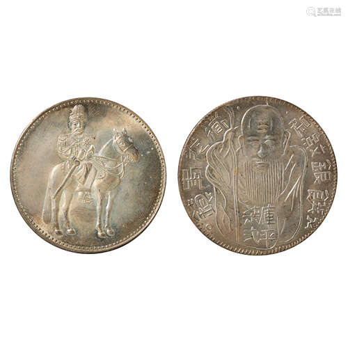 A PAIR OF CHINESE SILVER DOLLARS