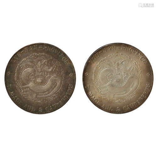 A PAIR OF CHINESE SILVER DOLLARS