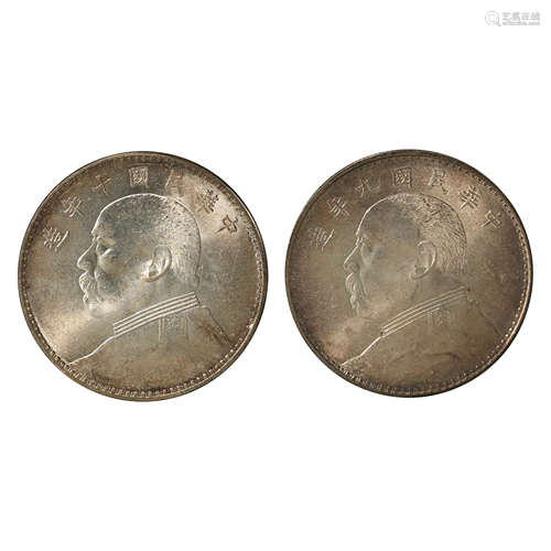 A PAIR OF CHINESE SILVER DOLLARS