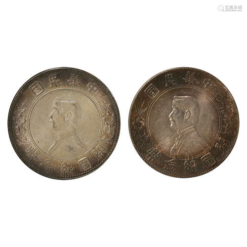 A PAIR OF CHINESE SILVER DOLLARS