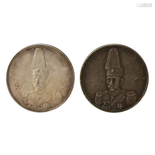 A PAIR OF CHINESE SILVER DOLLARS