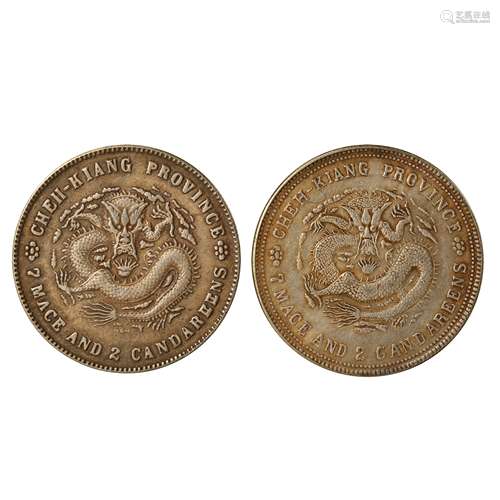 A PAIR OF CHINESE SILVER DOLLARS