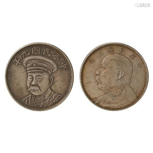 A PAIR OF CHINESE SILVER DOLLARS