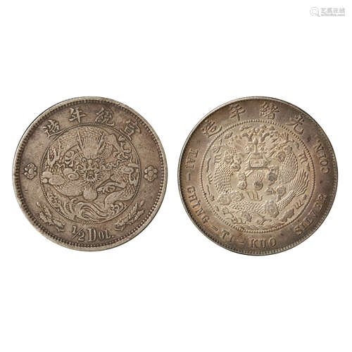 A PAIR OF CHINESE SILVER DOLLARS