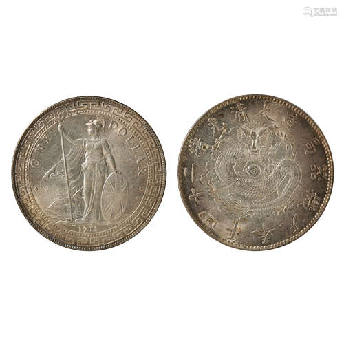 A PAIR OF CHINESE SILVER DOLLARS