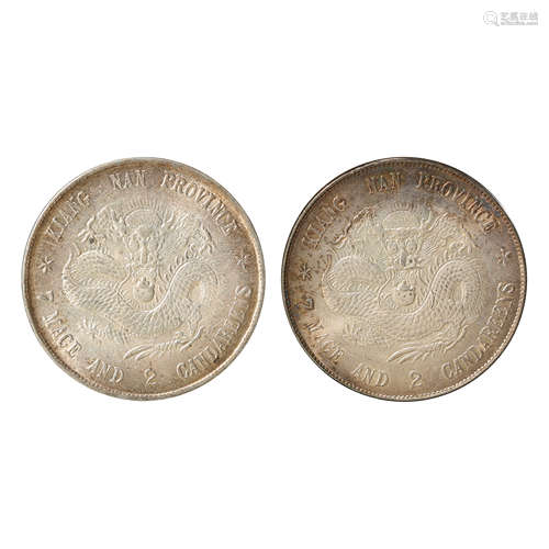 A PAIR OF CHINESE SILVER DOLLARS