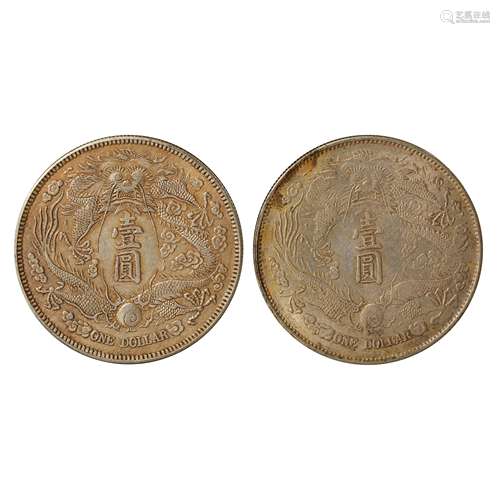 A PAIR OF CHINESE SILVER DOLLARS