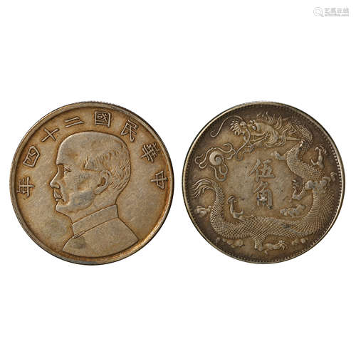 A PAIR OF CHINESE SILVER DOLLARS