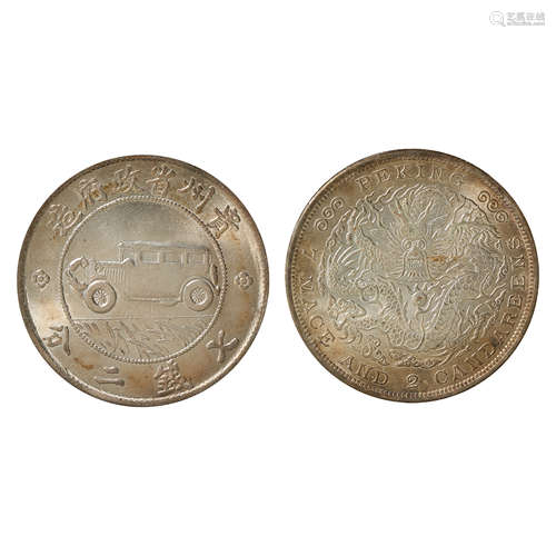 A PAIR OF CHINESE SILVER DOLLARS