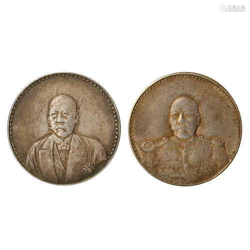 A PAIR OF CHINESE SILVER DOLLARS