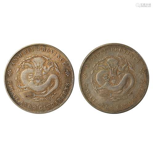 A PAIR OF CHINESE SILVER DOLLARS