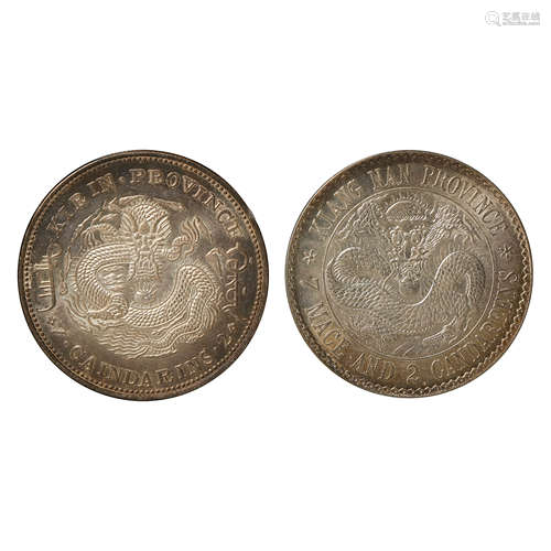 A PAIR OF CHINESE SILVER DOLLARS