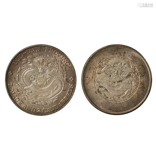 A PAIR OF CHINESE SILVER DOLLARS