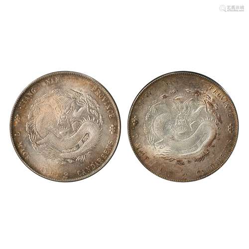 A PAIR OF CHINESE SILVER DOLLARS