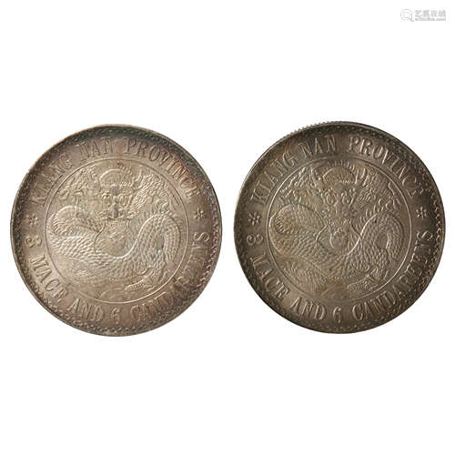 A PAIR OF CHINESE SILVER DOLLARS