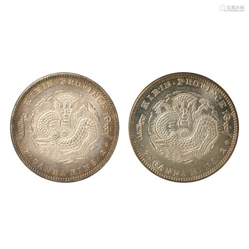 A PAIR OF CHINESE SILVER DOLLARS