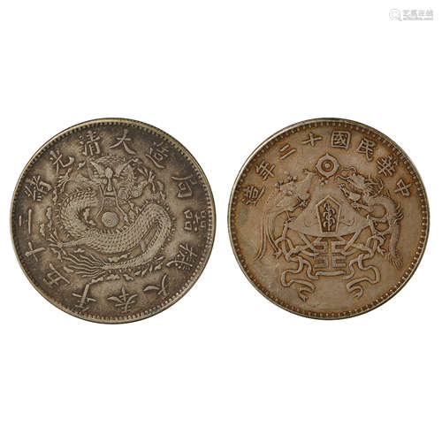 A PAIR OF CHINESE SILVER DOLLARS