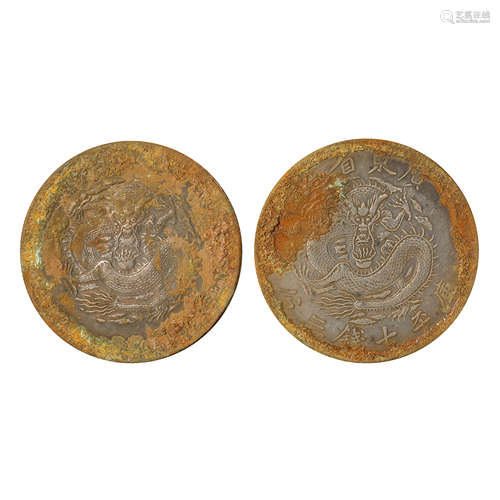 A PAIR OF CHINESE SILVER DOLLARS