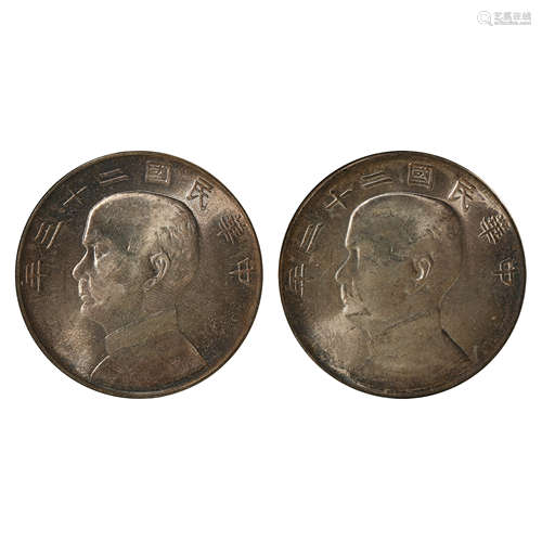 A PAIR OF CHINESE SILVER DOLLARS