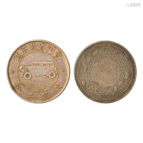 A PAIR OF CHINESE SILVER DOLLARS