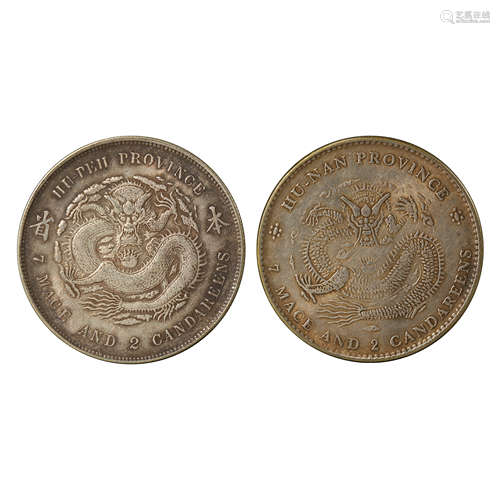 A PAIR OF CHINESE SILVER DOLLARS