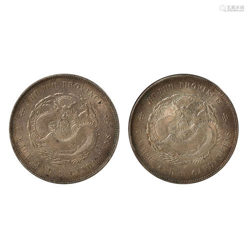 A PAIR OF CHINESE SILVER DOLLARS