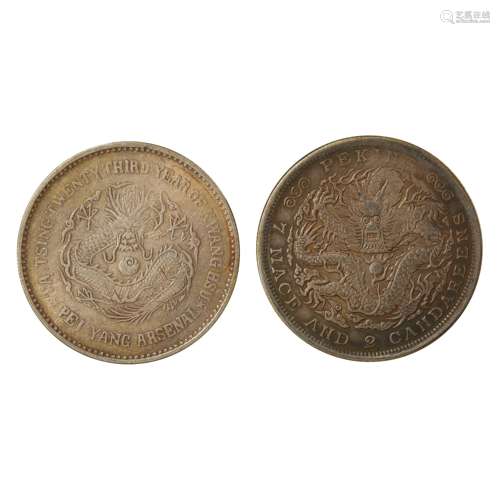 A PAIR OF CHINESE SILVER DOLLARS