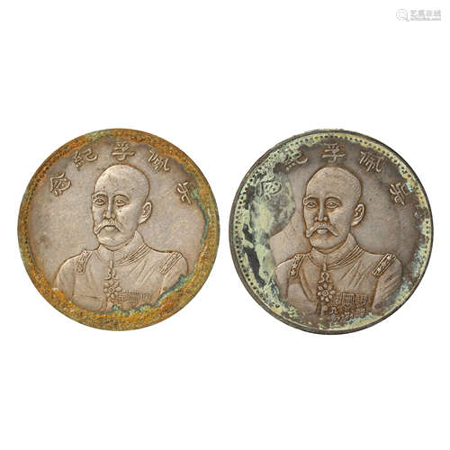 A PAIR OF CHINESE SILVER DOLLARS