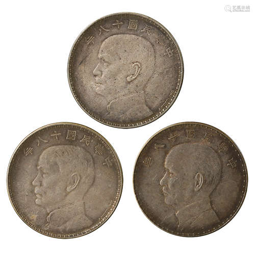 A SET OF CHINESE SILVER DOLLARS