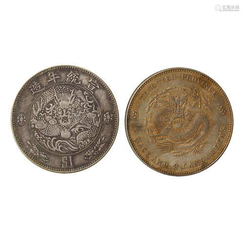 A PAIR OF CHINESE SILVER DOLLARS