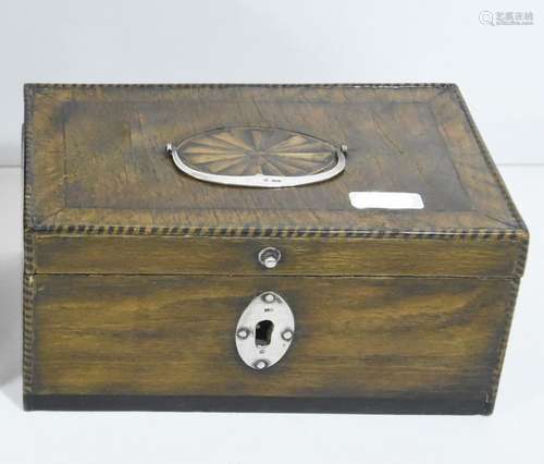 Wooden casket, probably mahogany with inlays and inlaid meda...