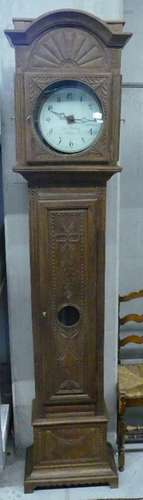 Grandfather clock with backglass dial with Arabic numerals,o...