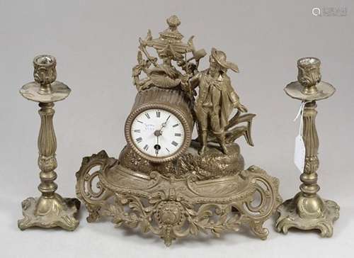 Fireplace clock with figural representation and pair of cand...