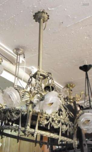 Oval ceiling chandelier with glass shades shaped as calyxes,...