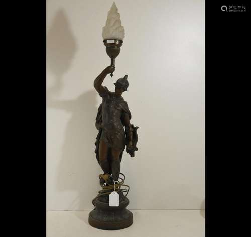 Table lamp with figural lamp base and a satin flame lampshad...