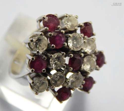 Ladies ring with 8 rubies and 9 diamonds,ca.0,9ct, 585 white...