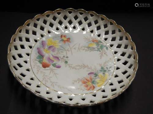 Deep bowl,openwork with floral decoration,reverse side marke...