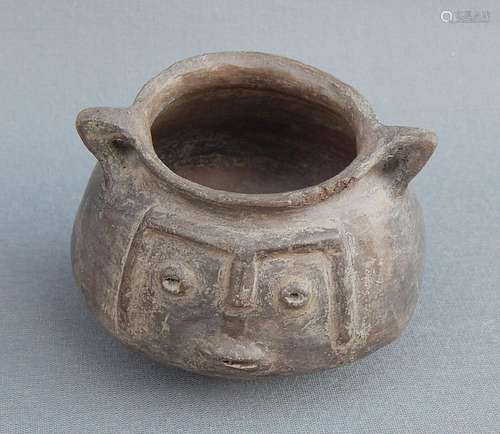 Small handle bowl with stylized face