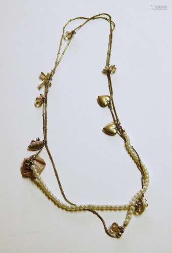 Long necklace with various pendants