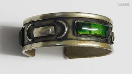 Bangle with enameled cer