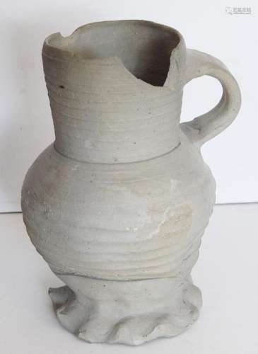 Handled clay jug,gray bo